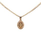 Medalla unisex en oro 10K con circonia